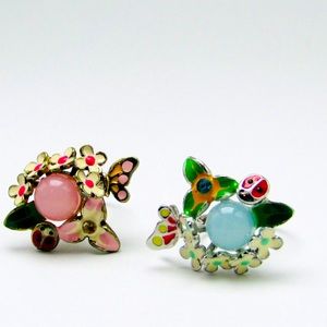 Two adjustable whimsical rings floral motif